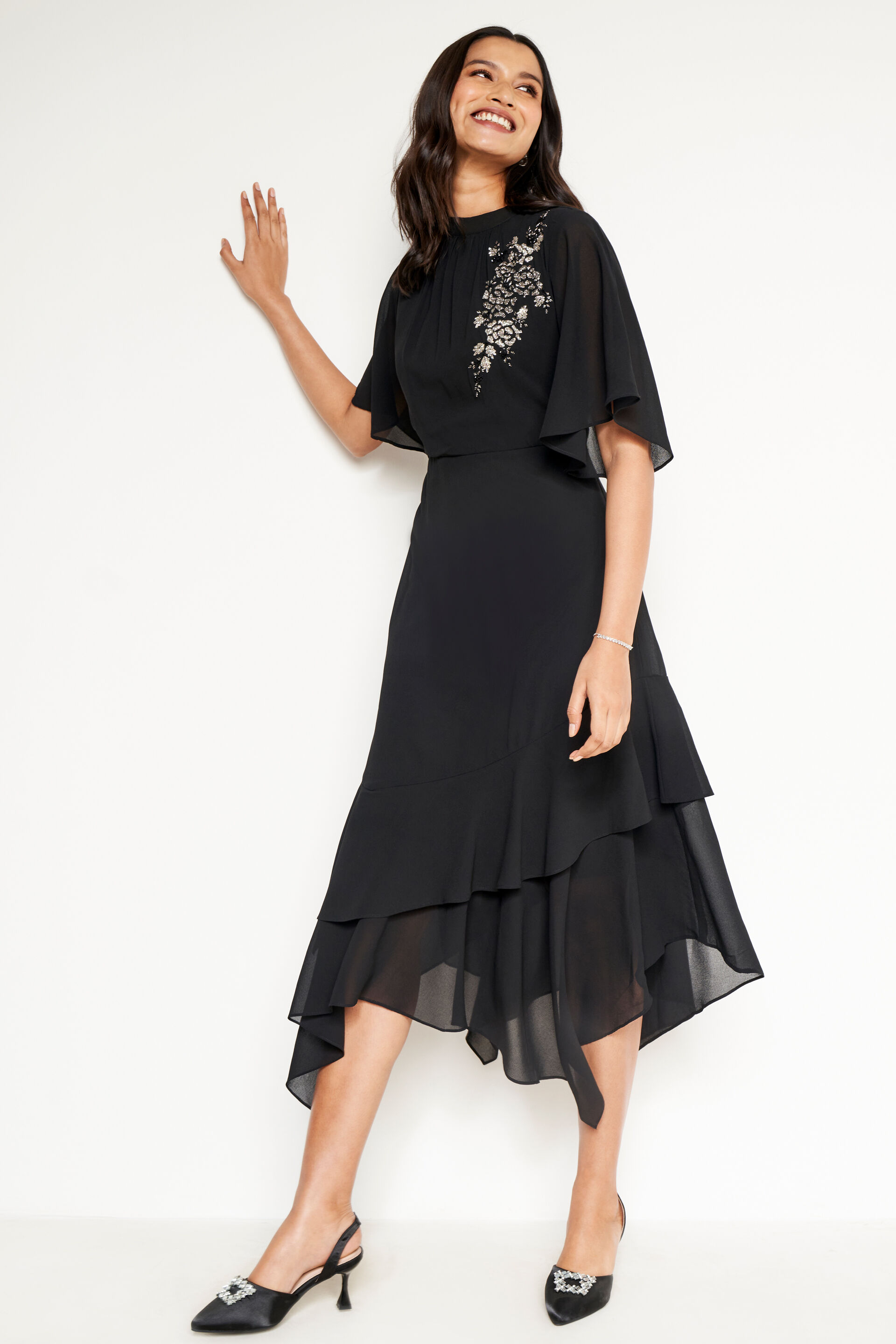 Buy our Black Solid Asymmetric Dress online from ANDIndia SC