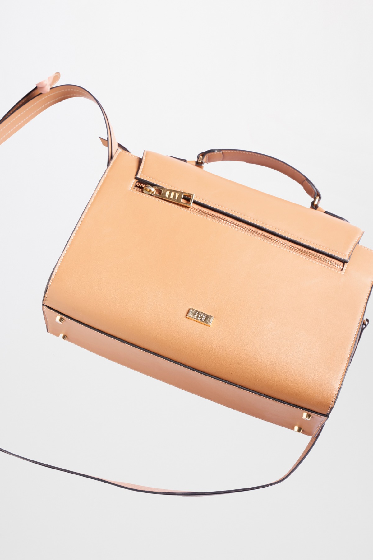 Tan handbags online india 2025