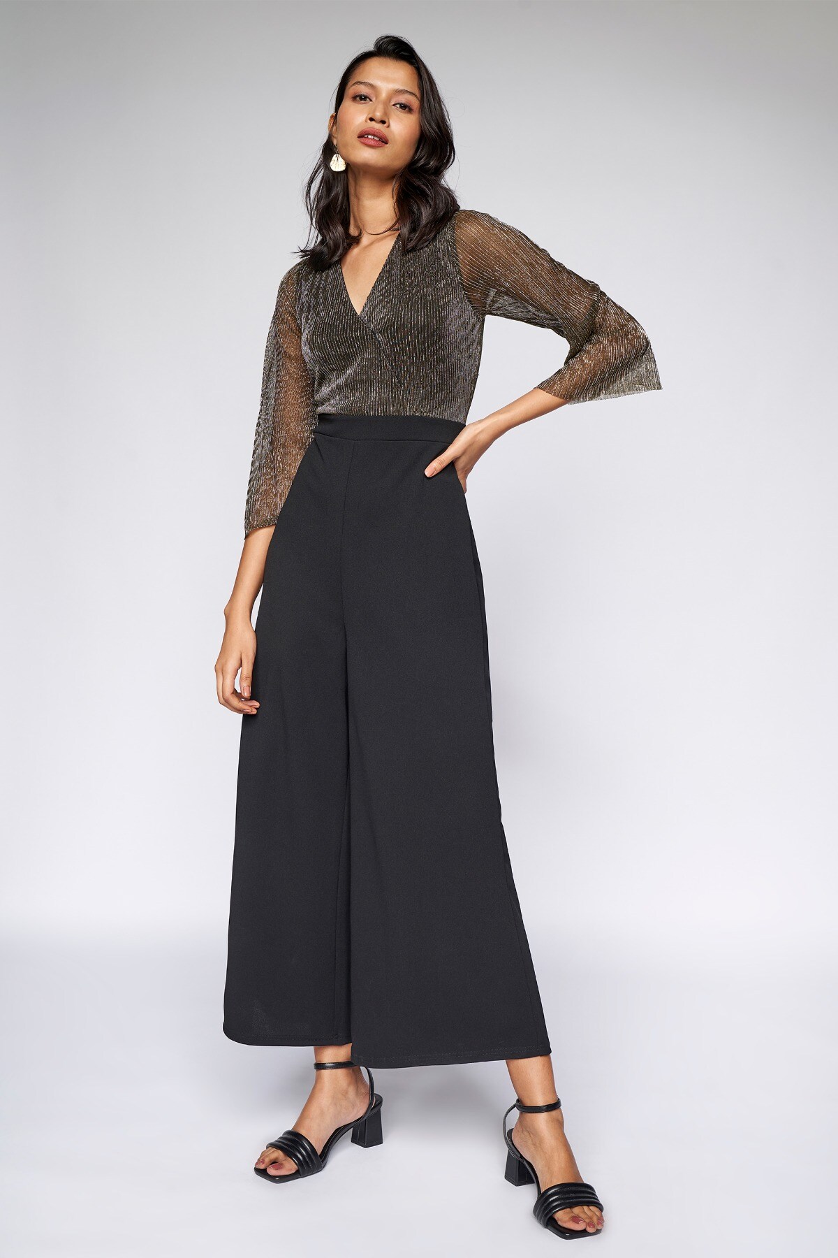 Gold flare jumpsuit store